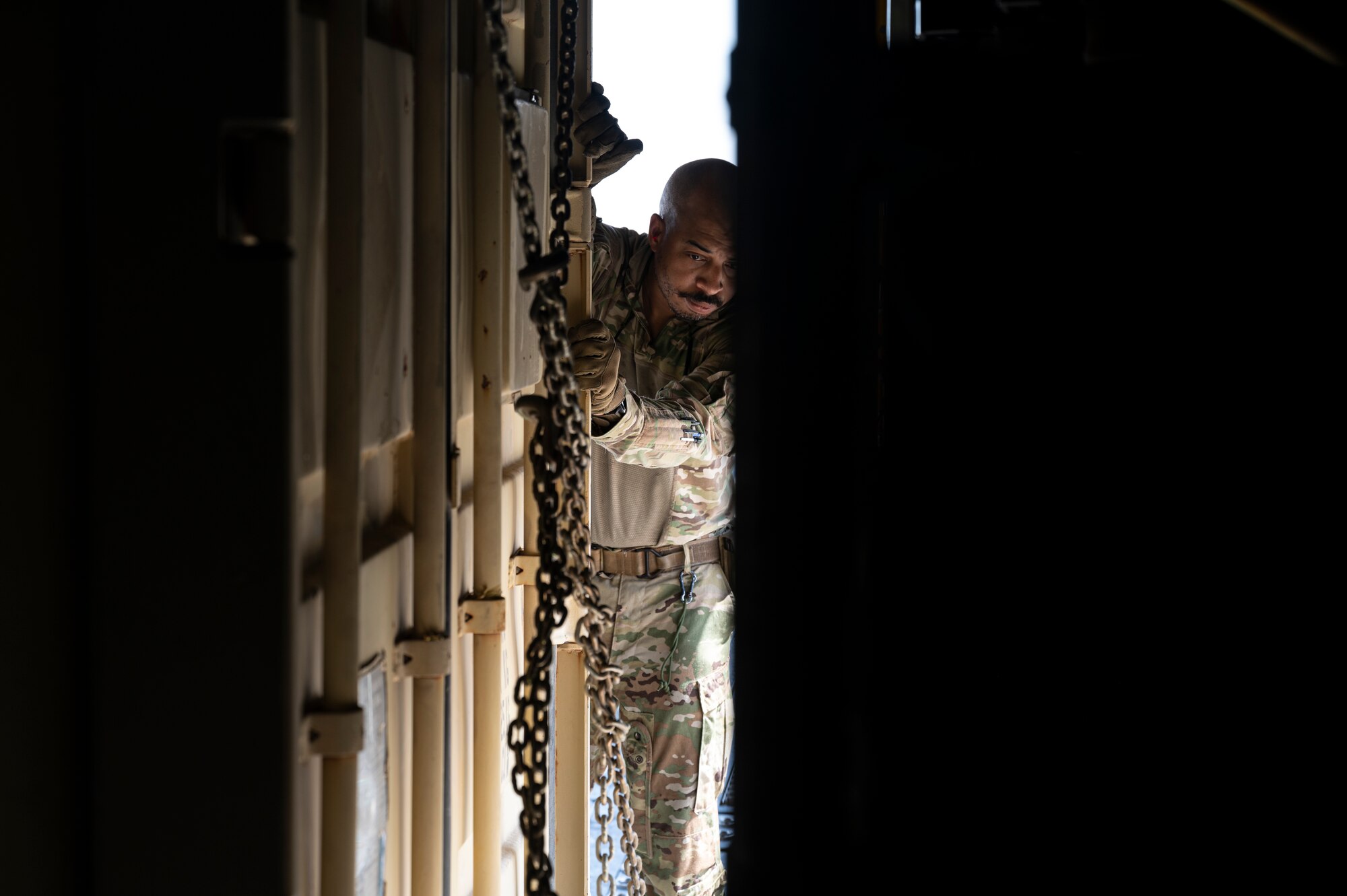 Tech. Sgt. Michael Jefferson, a loadmaster with the 779th Expeditionary Airlift Squadron, loads cargo on a C-130H Hercules in Iraq, Sept. 16, 2021.