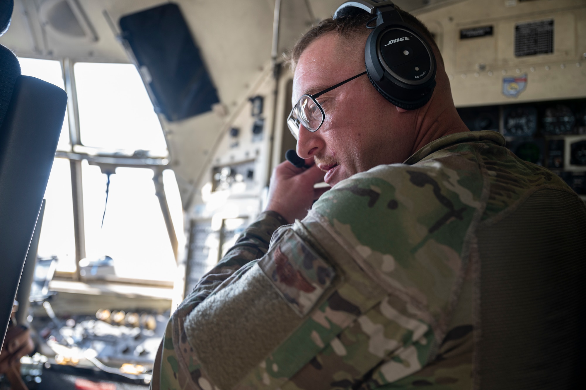 U.S. Air Force Capt. John-David Green, a navigator with the 779th Expeditionary Airlift Squadron, conducts pre-flight checks on a C-130H Hercules at Al Asad Air Base, Iraq, Sept. 16, 2021.