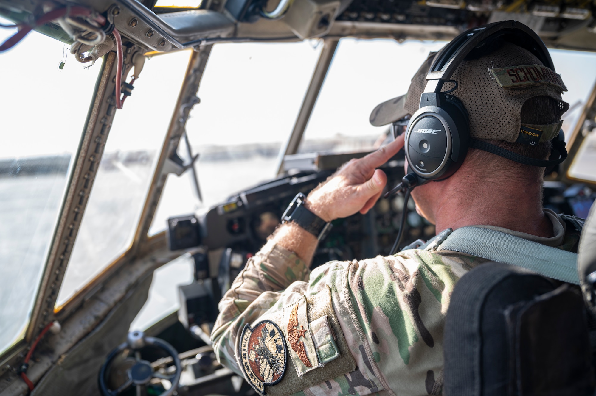 U.S. Air Force Maj. Chris Schomburg, a pilot with the 779th Expeditionary Airlift Squadron, conducts pre-flight checks on a C-130H Hercules at Al Asad Air Base, Iraq, Sept. 16, 2021.