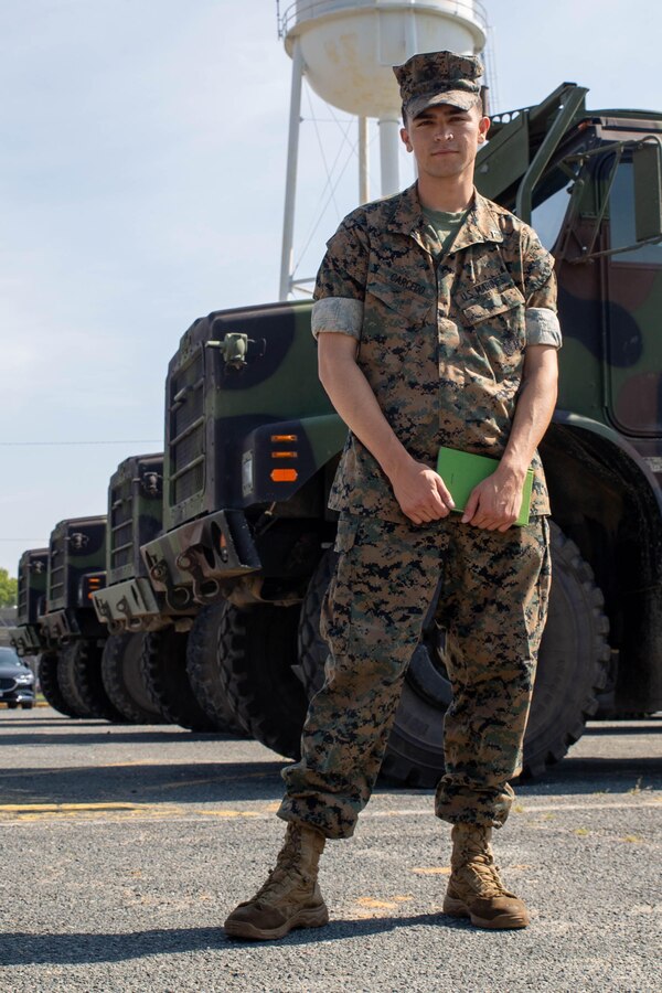 U.S. Marine Corps Lance Cpl. Antonio P. Carcedo, a motor transportation operator, for The Basic School, not only provides logistical movement support, but also works as a marksmanship coach aboard Marine Corps Base Quantico, Va., Sept. 8.Carcedo, a native of Pico Rivera, Calif., operates an MK 27 Extended Cargo Truck, which allows Marines to transport personnel and equipment over difficult terrain and hazardous environments. (U.S. Marine Corps photo by Lance Cpl. Jennifer Sanchez)