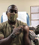 Lt. Gen. R. Scott Dingle, Surgeon General of the Army, receives his first dose of a COVID-19 vaccine.