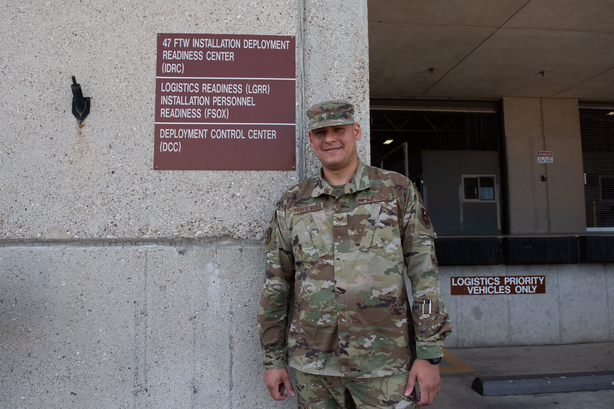 SSgt. Xavier Perez Vera, 47th Logistics Readiness Flight (LRF) Installation Deployment Readiness Cell (IDRC) logistics planner,  stands outside of his office building at Laughlin Air Force Base, Texas, October 4, 2021. Perez Vera works with (U.S. Air Force photo by Airman Kailee Reynolds)