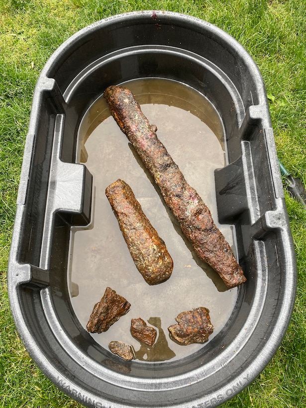 Concreted artifacts, sample fragments of pig iron ballast, recovered from the site.