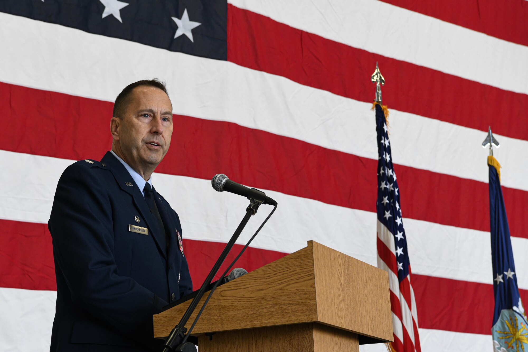 Lt. Col. Joseph C. Winchester, the commander of the 910th Maintenance Group, expresses his confidence in the new 910th Maintenance Squadron Commander, Maj. Russell R. Whitlock, Oct. 2, 2021, at Youngstown Air Reserve Station, Ohio.