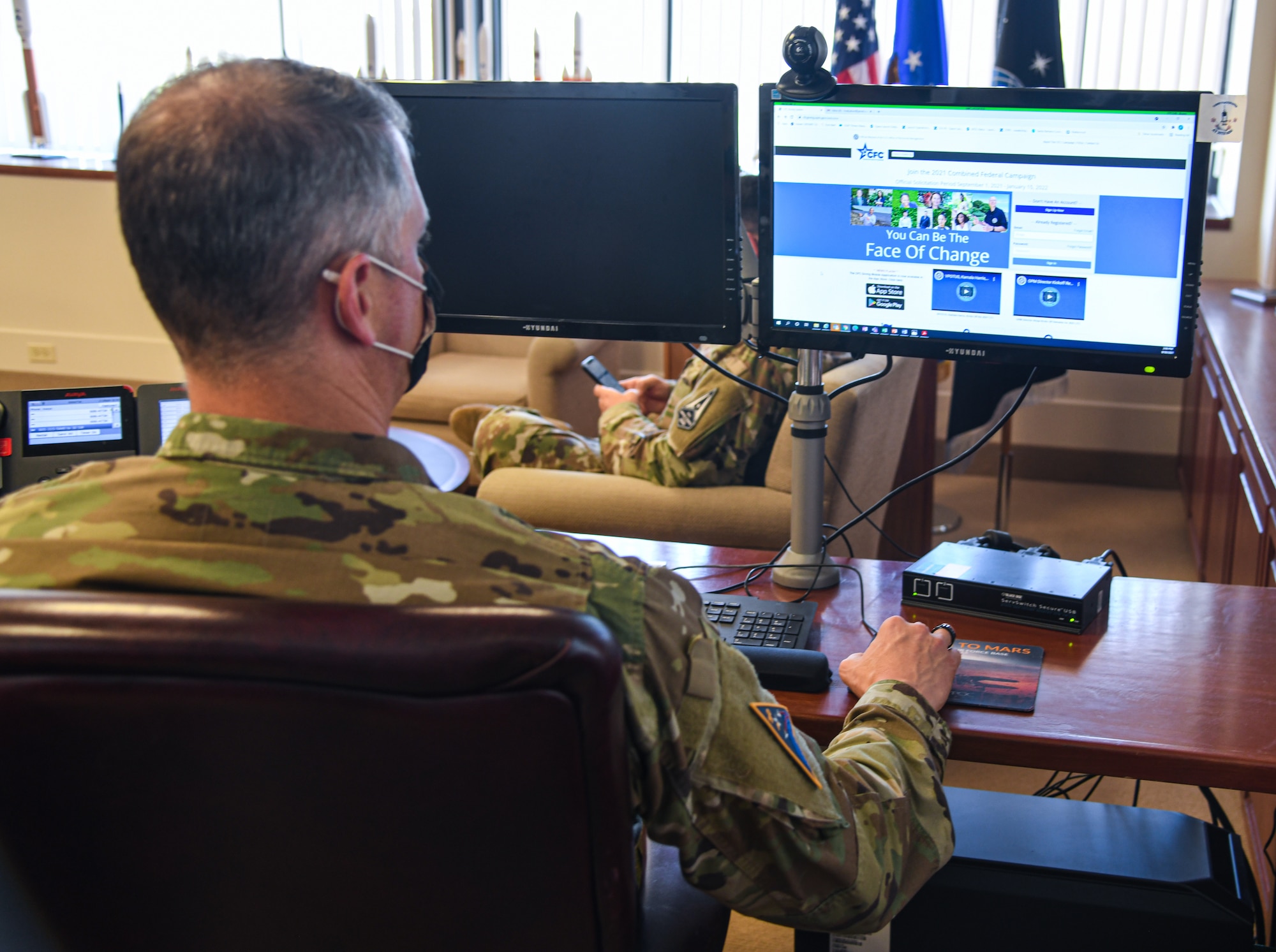 Col. Robert Long, Space Launch Delta 30 commander, digitally signs the Combined Federal Campaign document to kick off this year’s charity event at Vandenberg Space Force Base, Calif., Sept. 30, 2021. Long logs into the CFC website to show how Airmen and Guardian donations can be made digitally. (U.S. Space Force Photo by Airman 1st Class Rocio Romo)