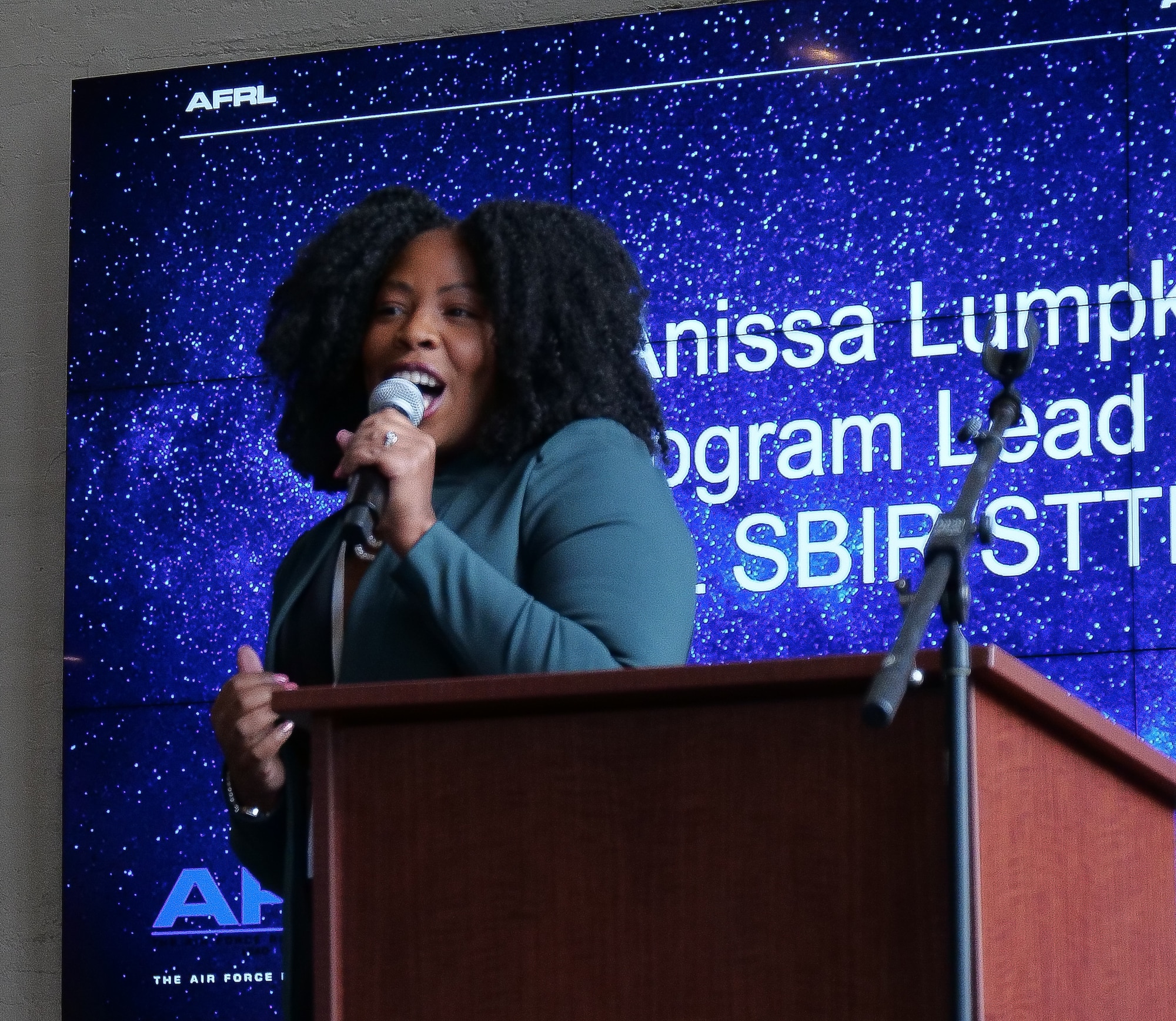 Anissa Lumpkin, AFRL Center Lead for the AF SBIR/STTR program, welcomes attendees of the first Air Force Technology Executive Officer Pitch Day Nov. 15, 2019 at the Steam Plant and the Wright Brothers Institute in Dayton. (U.S. Air Force photo/Keith Lewis)