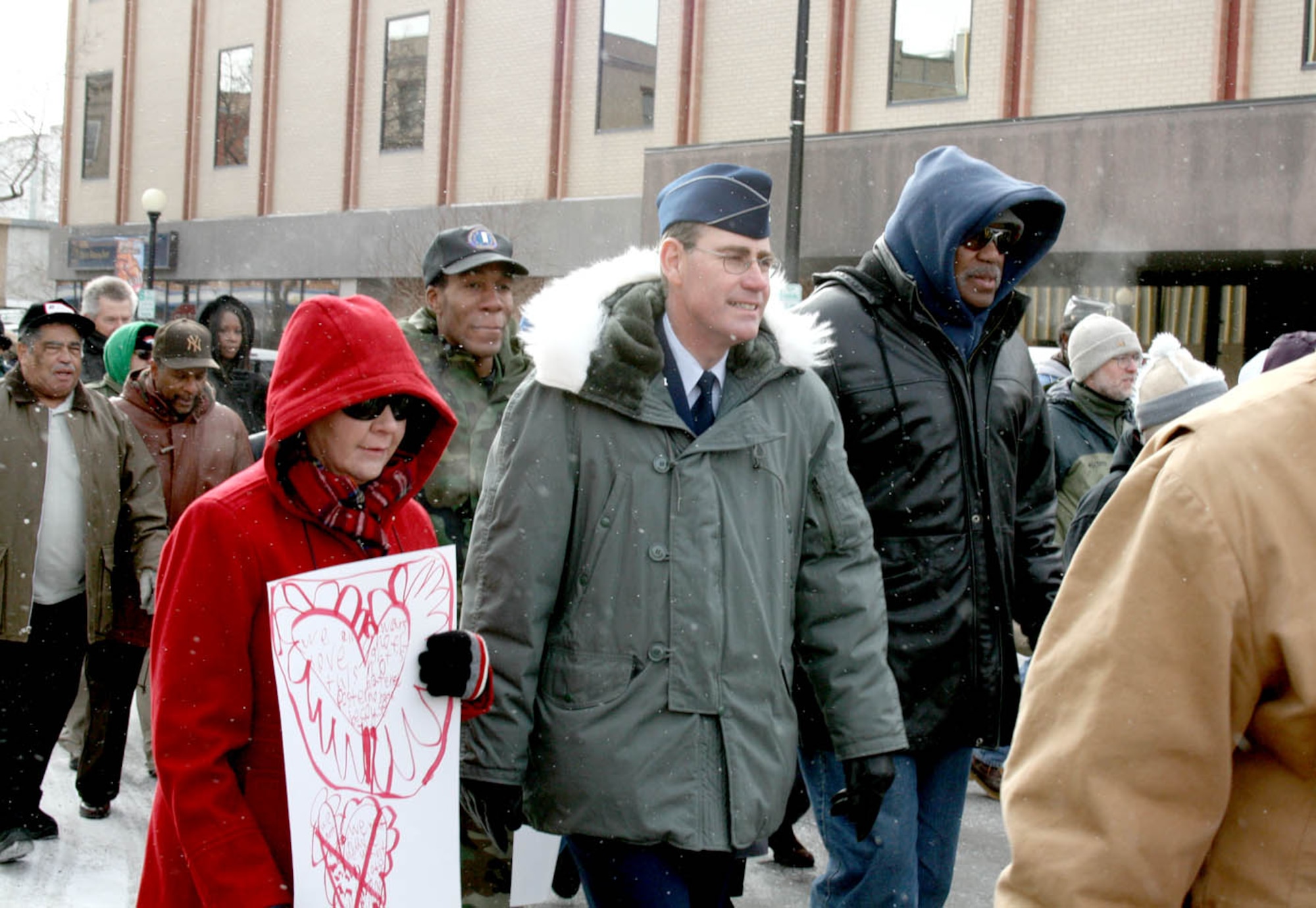Col Morgan and his wife, Terri, walk in a parade in Cheyenne, Wyoming. (Courtesy photo by Capt. Mary Danner)
