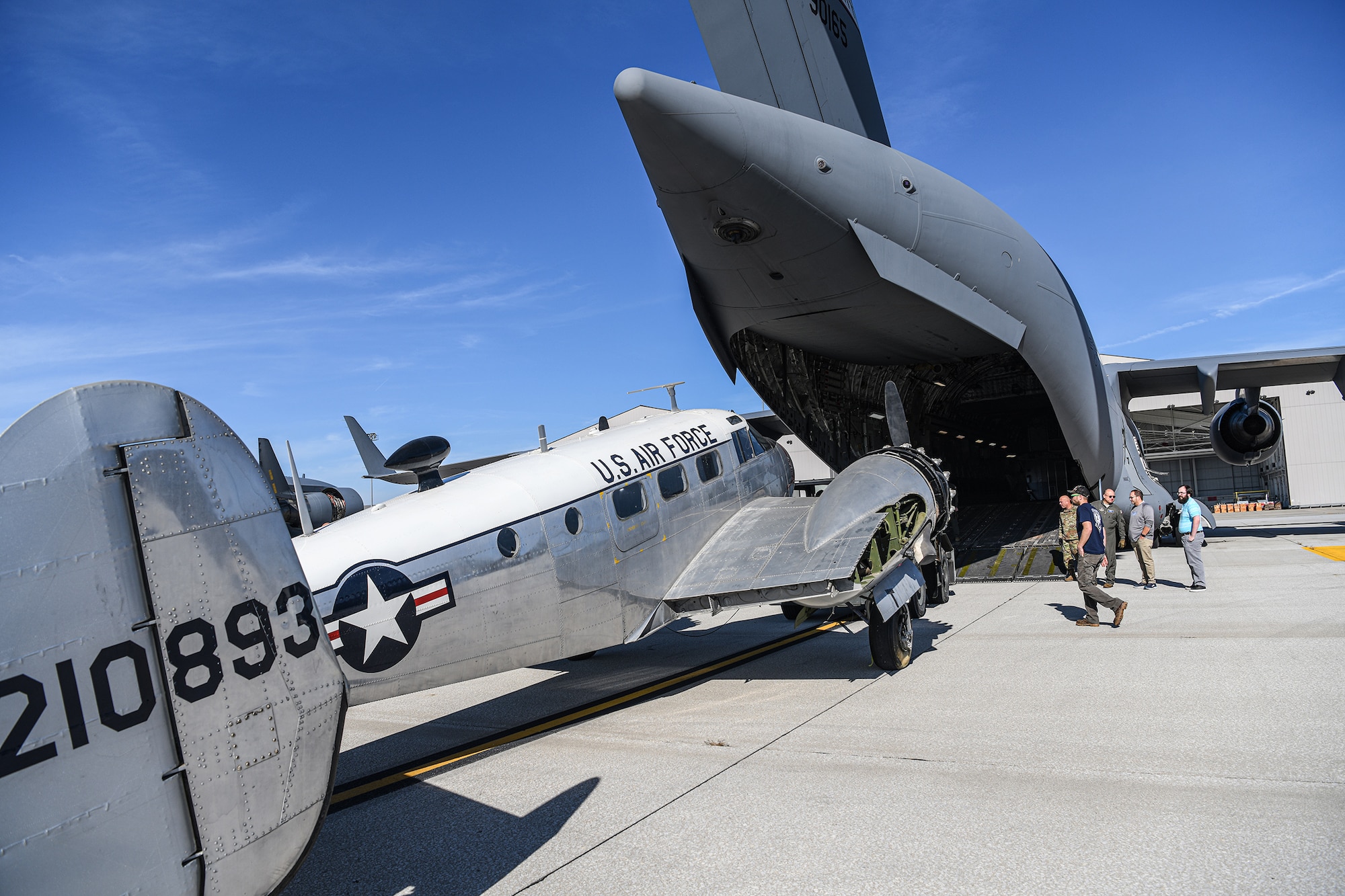 A 445th Airlift Wing C-17 Globemaster III transported a historic C-45H aircraft loaned by the National Museum of the U.S.A.F. to the Museum of Aviation at Robins Air Force Base, Ga. Oct. 1, 2021