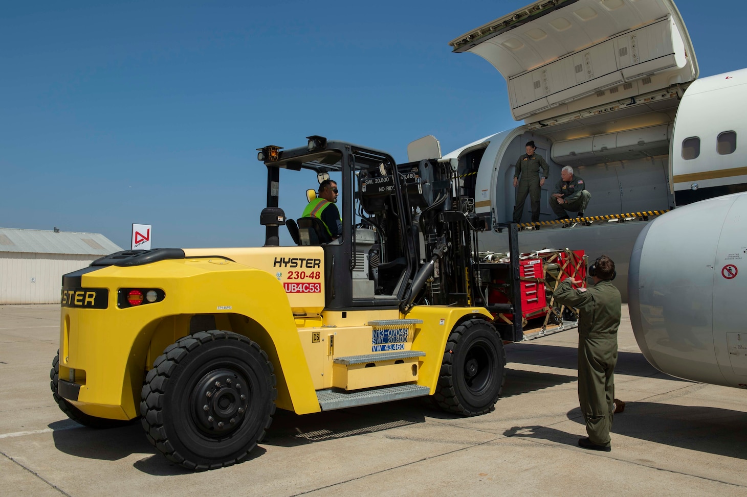 SAN DIEGO (Aug. 7, 2021) Sailors assigned to Fleet Logistics Support Squadron (VR) 57 Naval Facilities Engineering Systems Command personnel load Fleet Logistics Multi-Mission Squadron (VRM) 30 cargo onto VR-57's C-40 Clipper at Brown Field Municipal Airport. The VRM-30 detachment is currently deployed with Carrier Strike Group (CSG) 1 as the first CMV-22 Osprey detachment embarked for a CSG deployment. (U.S. Navy photo by Mass Communication Specialist 1st Class Chelsea Milburn)
