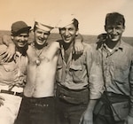 Photograph of Radarman Sy Siegel with shipmates aboard the Aquarius. (Courtesy of Siegel Family)