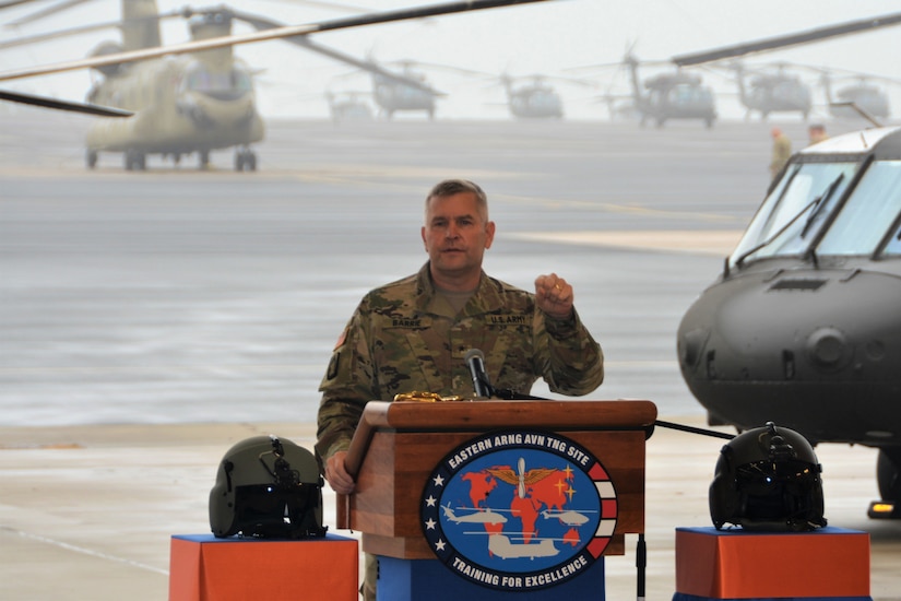 Brig. Gen. Robert Barrie, the U.S. Army’s Program Officer-Aviation, speaks at a ribbon-cutting ceremony for the UH-60V Black Hawk helicopter on Oct. 6, 2021, at the Eastern Army National Guard Aviation Training Site at Fort Indiantown Gap, Pa. EAATS was the first unit in the Army – active duty, National Guard or Army Reserve – to receive the new variant.