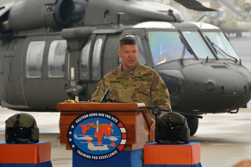 Brig. Gen. Stanley Budraitis, deputy commander of the U.S. Army Aviation Center of Excellence and Fort Rucker, Alabama, speaks at a ribbon-cutting ceremony for the UH-60V Black Hawk helicopter on Oct. 6, 2021, at the Eastern Army National Guard Aviation Training Site at Fort Indiantown Gap, Pa. EAATS was the first unit in the Army – active duty, National Guard or Army Reserve – to receive the new variant.