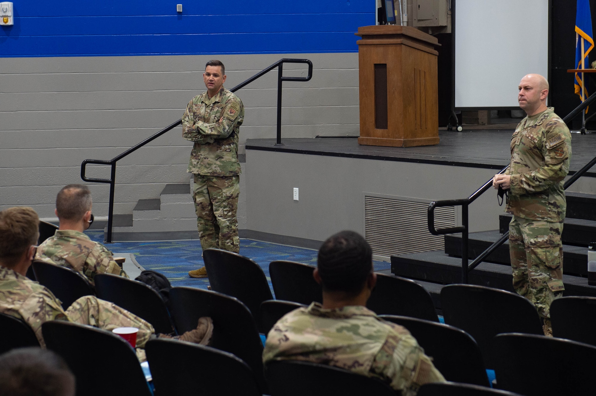 A photo of Airmen speaking.