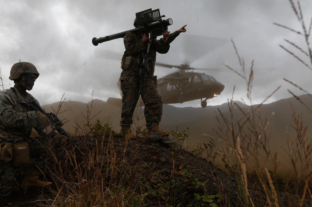 U.S. Marine Corps Cpl. Brendan Davis, attached to 2nd Battalion, 3rd Marines, provides anti-air defense with a FIM-92E Stinger during Noble Jaguar 2021 at Combined Arms Training Center, Camp Fuji, Japan, Sept. 30, 2021. This portion of the exercise focused on coastal defense and counter-landing operations across a distributed maritime environment. III Marine Expeditionary Force executed these actions as a part of an integrated operation with joint forces to maintain readiness and demonstrate U.S. resolve to preserve regional security.