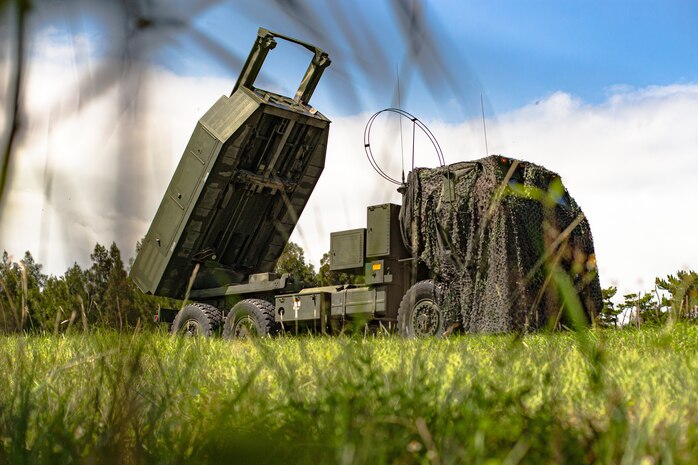 U.S. Marine Corps High Mobility Artillery Rocket Systems with 3rd Battalion, 12th Marines conduct a fire mission during Exercise Noble Jaguar 2021 within the Central Training Area on Okinawa, Japan, Sept. 30, 2021. The Marine Corps and Navy leveraged integrated command and control and joint sensors to expand battlefield awareness, share targeting data, and conduct long-range precision strikes in support of sea control and sea denial in contested maritime environments. III Marine Expeditionary Force executed these actions as a part of an integrated operation with 7th Fleet to maintain readiness and demonstrate U.S. resolve to preserve regional security.