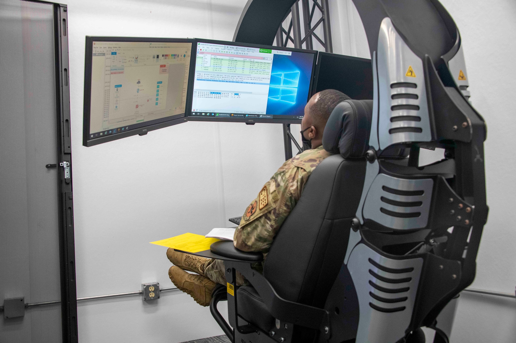 U.S. Air Force Master Sgt. Christopher Barrow, 97th Communications Squadron (CS) Operations Flight chief, looks at network traffic during the 97th CS Mission Defense Team’s first cyber defense exercise at Altus Air Force Base, Oklahoma, Sept. 30, 2021. The exercise took roughly four hours to complete, with members using tools such as Snort, Wireshark, and a pfSense firewall. (U.S. Air Force photo by Staff Sgt. Cody Dowell)