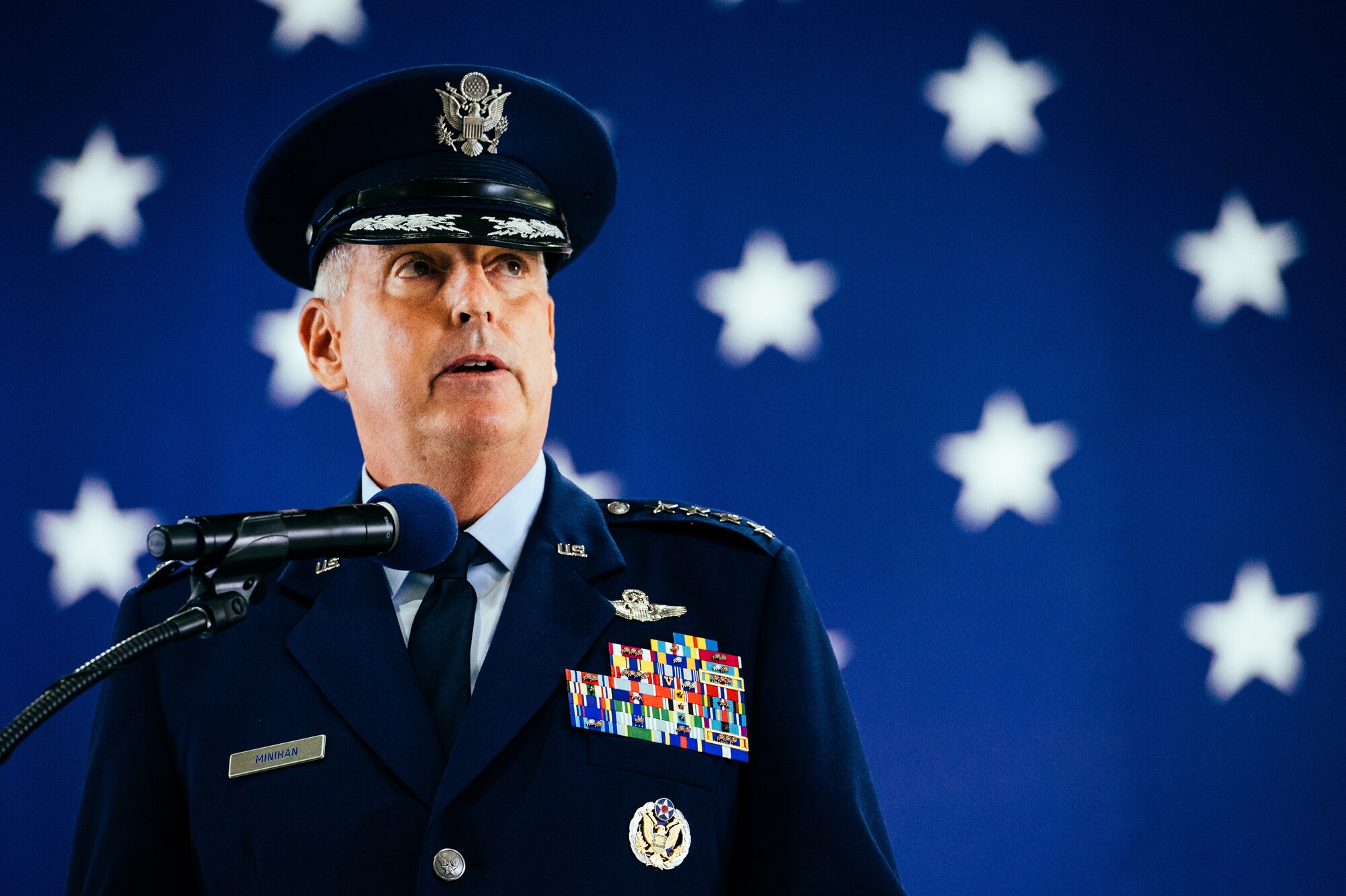 Gen. Mike Minihan, incoming Air Mobility Command commander, gives a speech at Scott Air Force Base, Ill., Oct. 5, 2021. Minihan succeeded Gen. Jacqueline D. Van Ovost.
