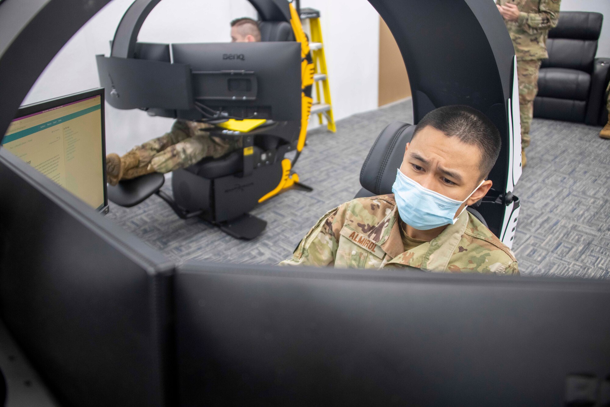 U.S. Air Force Senior Airman Kailan Almirol, 97th Communications Squadron (CS) Mission Defense Team cyber operator, looks over at the firewall for the 97th CS Mission Defense Team’s (MDT) first cyber defense exercise at Altus Air Force Base, Oklahoma, Sept. 30, 2021. Each member of the MDT was assigned different roles and objectives of cyber defense during the exercise. (U.S. Air Force photo by Staff Sgt. Cody Dowell)