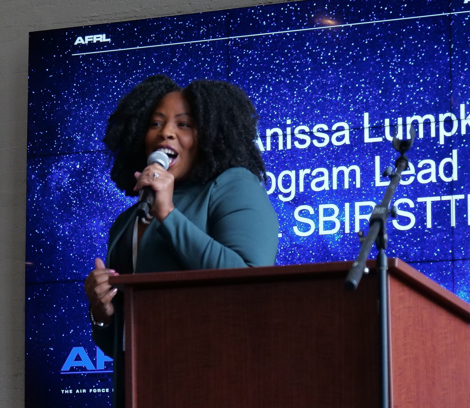 Anissa Lumpkin, AFRL Center Lead for the AF SBIR/STTR program, welcomes attendees of the first Air Force Technology Executive Officer Pitch Day Nov. 15, 2019 at the Steam Plant and the Wright Brothers Institute in Dayton. (U.S. Air Force photo/Keith Lewis)