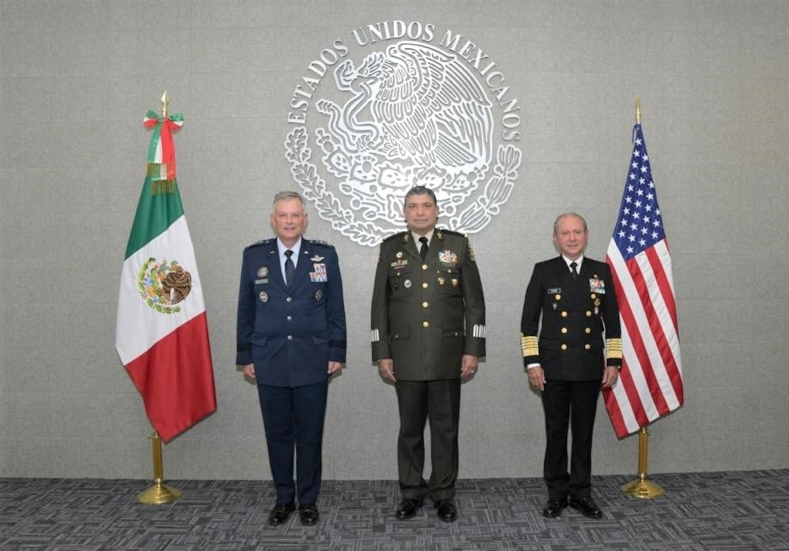 U.S. Air Force Gen. Glen D. Vanherck, commander of North American Aerospace Defense Command and U.S. Northern Command meets with Mexican Gen. Luis Cresencio Sandoval González, Secretary of the National Defense and Mexican Adm. José Rafael Ojeda Durán, Secretary of the Navy during the Feria Aeroespacial México (FAMEX), or the Mexico Aerospace Fair, at Base Aérea No.1 de Santa Lucía, Mexico, Sep. 22, 2021. The U.S. participated in the air show as the “country of honor,” a special designation signifying the partnership and cooperation between both countries.