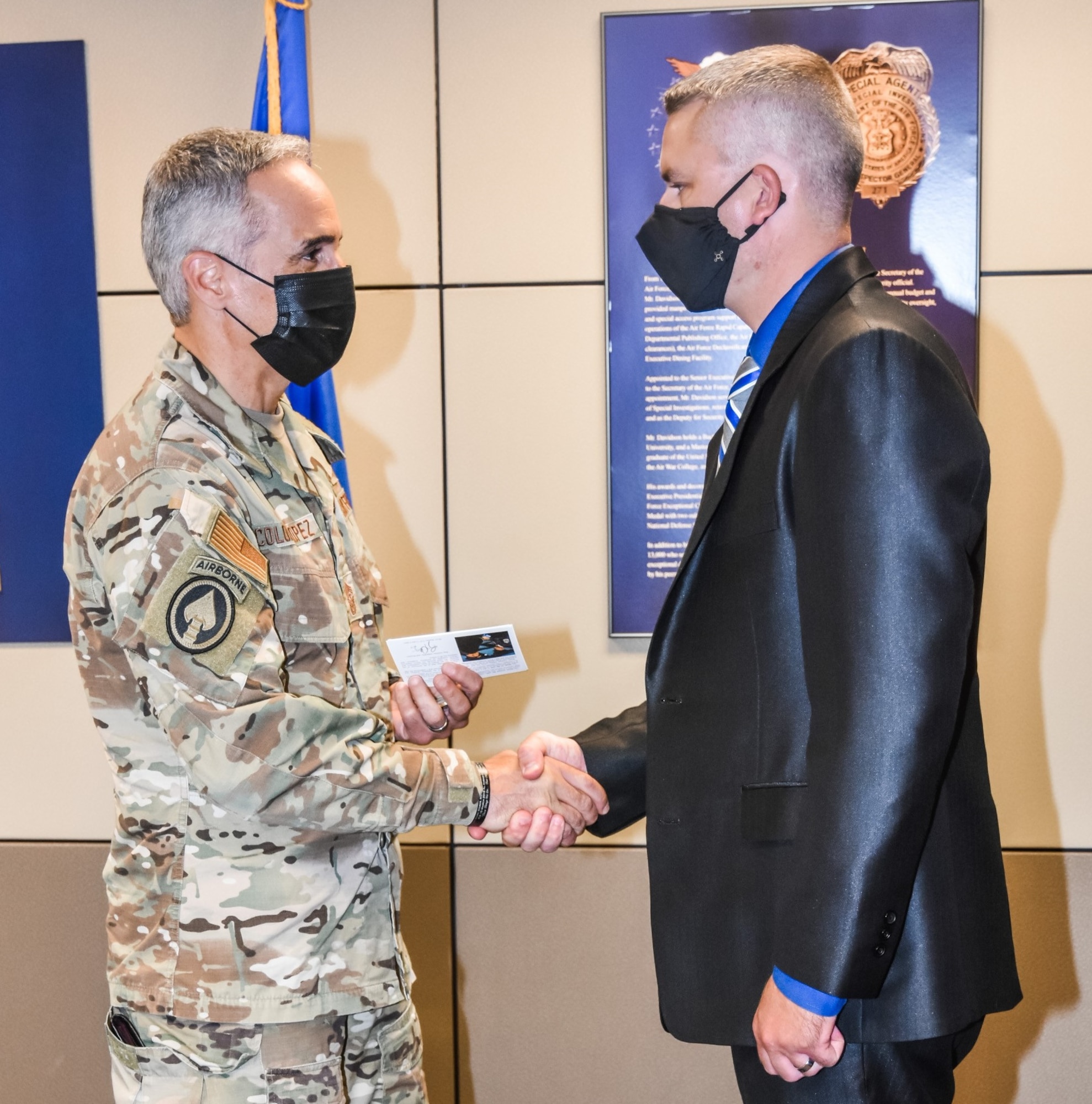 SEAC Ramon Colon-Lopez, the Senior Enlisted Advisor to the Chairman of the Joint Chiefs of Staff, presents an Outstanding Performer Award to Office of Special Investigations Special Agent Dennis Hopwood, during his visit to OSI headquarters at Quantico, Va., Oct. 1, 2021. Master Sgt. Martha Dunham and SA Aaron Simmons were also recognized by the SEAC for their outstanding performance. The SEAC visit supported OSI’s observance of National Hispanic Heritage Month and this year’s theme, Esperanza: A Celebration of Hispanic Heritage and Hope. (Photo by SA Christina Williams)