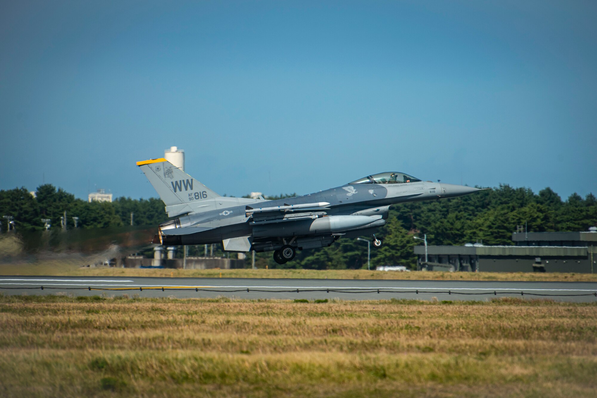 Fighter wing takes off from Misawa Air Base runway.