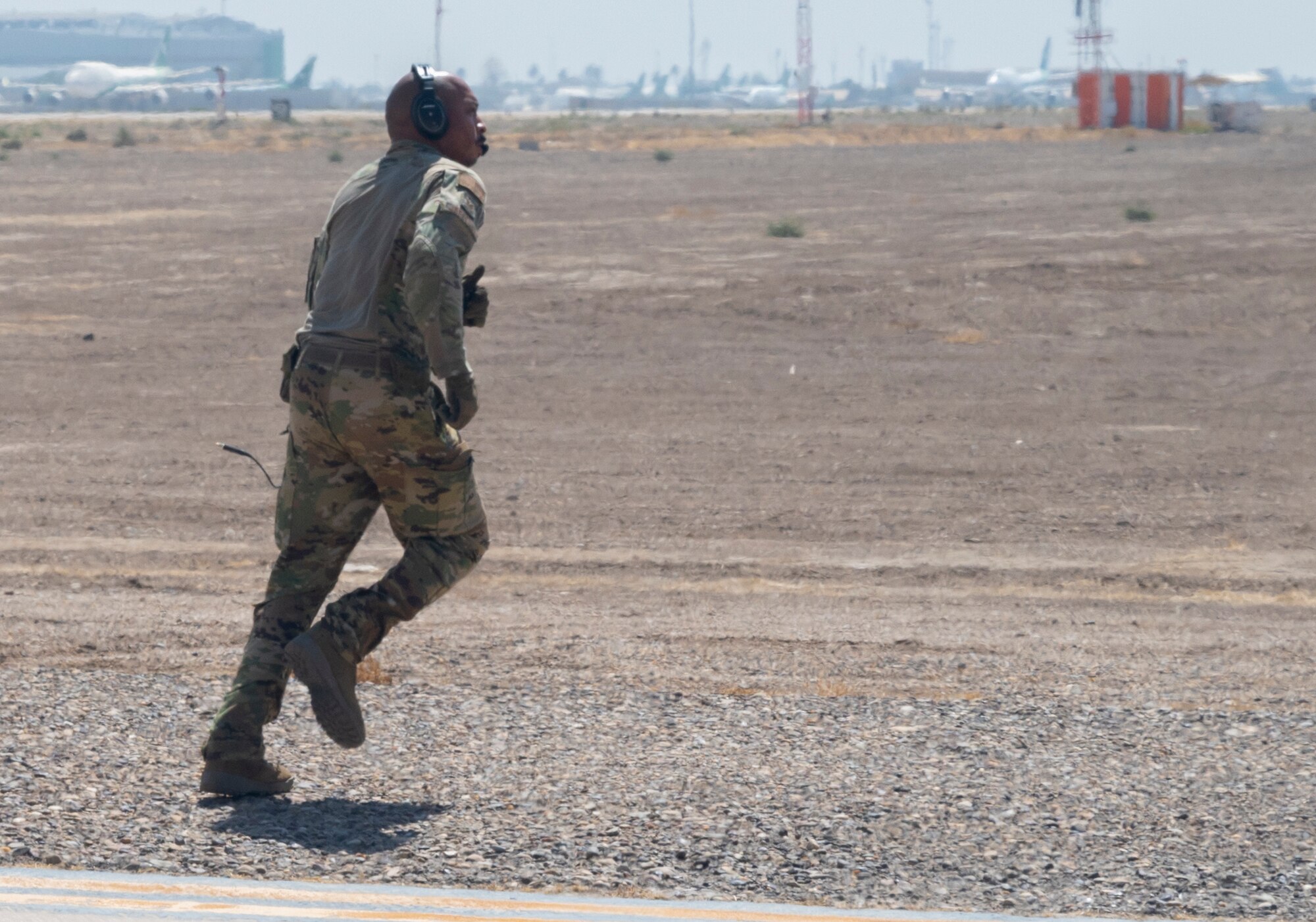 Tech. Sgt. Michael Jefferson, a loadmaster with the 779th Expeditionary Airlift Squadron, checks the outside of a C-130H Hercules at an undisclosed location in Southwest Asia, Sept. 16, 2021.