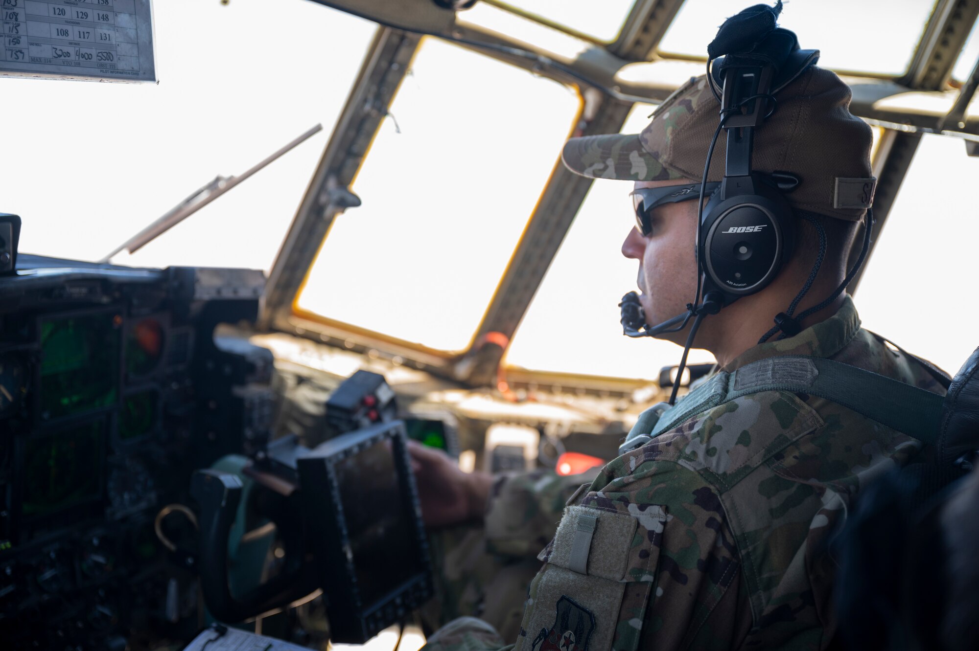 U.S. Air Force Capt. Wilfredo Silva, a pilot with the 779th Expeditionary Airlift Squadron, conducts pre-flight checks on a C-130H Hercules at Al Asad Air Base, Iraq, Sept. 16, 2021.