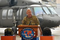 Pennsylvania Adjutant General Maj. Gen. Mark Schindler speaks at a ribbon-cutting ceremony for the UH-60V Black Hawk helicopter on Oct. 6, 2021, at the Eastern Army National Guard Aviation Training Site at Fort Indiantown Gap, Pa. EAATS was the first unit in the Army – active duty, National Guard or Army Reserve – to receive the new variant.