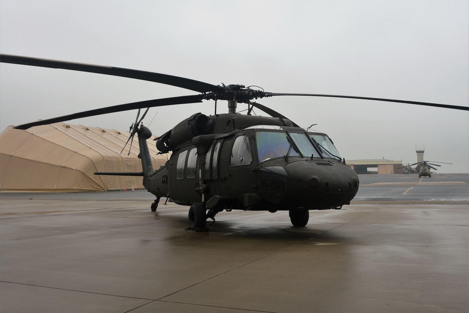 A UH-60V Black Hawk helicopter is parked on Muir Army Airfield for a ribbon-cutting ceremony for the new variant Oct. 6, 2021, at the Eastern Army National Guard Aviation Training Site at Fort Indiantown Gap, Pa. EAATS was the first unit in the Army – active-duty, National Guard or Army Reserve – to receive the new variant.