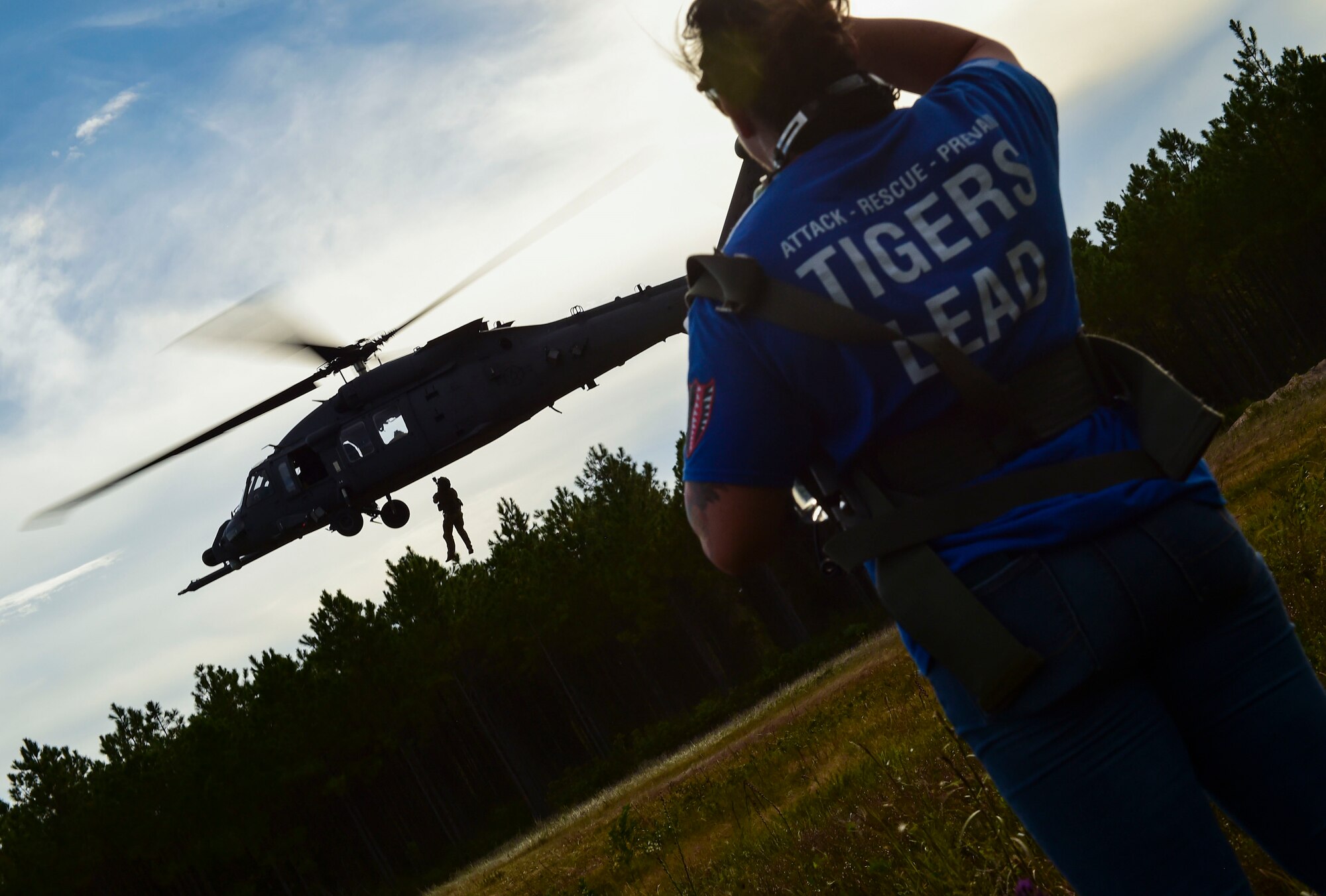 woman looking at a helicopter