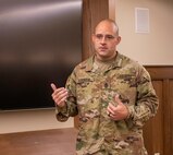 Newly-promoted Illinois Army National Guard Sgt. Maj. Nicholaus Fordham, of Sherman, Illinois, thanks friends and family during his promotion ceremony at the Joint Force Headquarters, Camp Lincoln, Springfield, Illinois, Sept. 16.