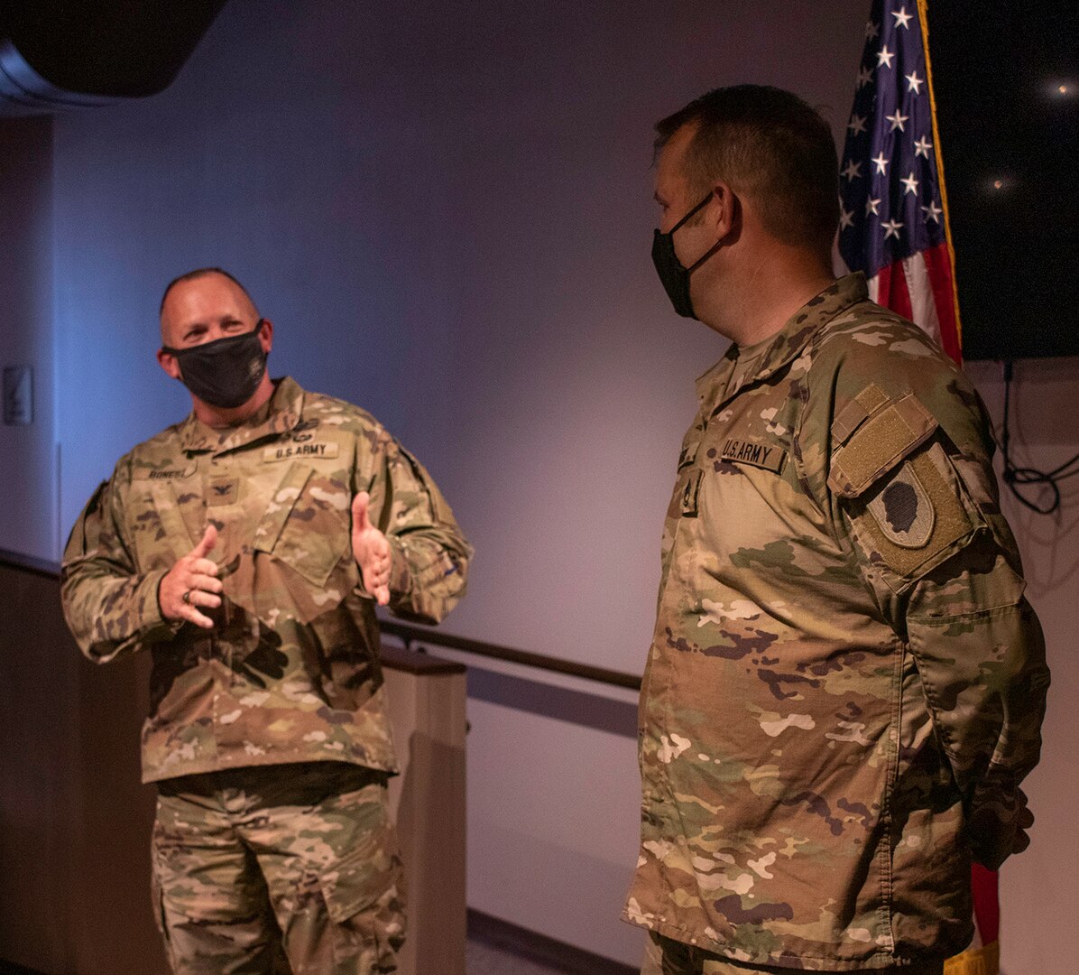 Col. Ron Bonesz, Military Personnel Officer, Illinois Army National Guard, congratulates newly promoted Master Sgt. Matthew Harris, of Petersburg, Illinois, during his promotion ceremony Sept. 16 at the Illinois State Military Museum, Springfield, Illinois.