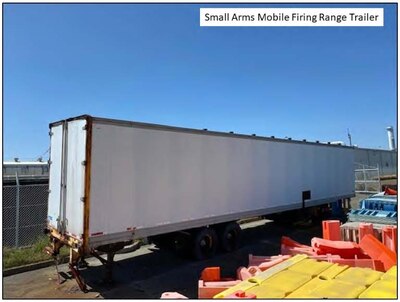 A rusted out trailer holding a mobile small arms firing range in Yokosuka, Japan.