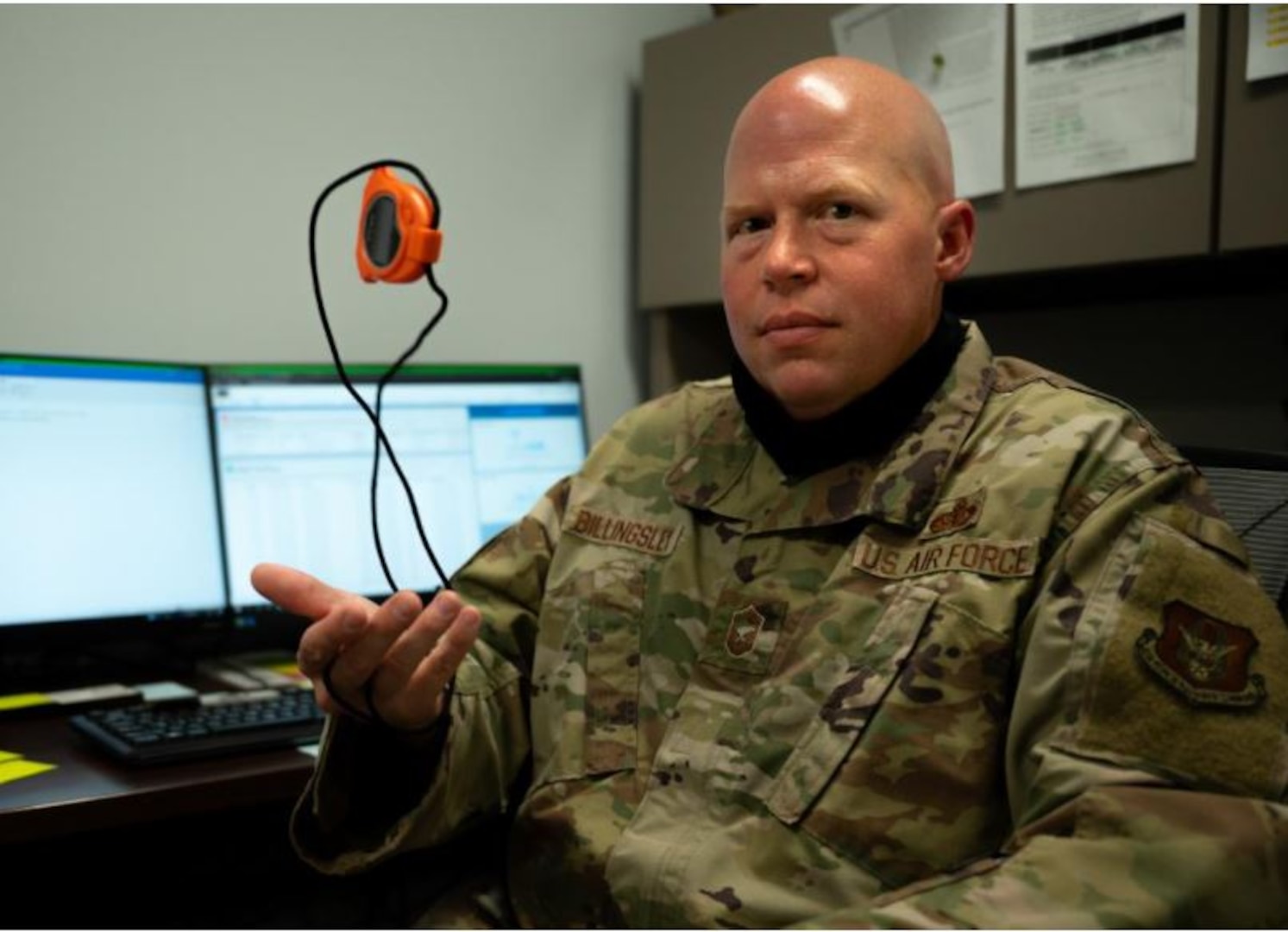 U.S. Air Force Senior Master Sgt. Jason Billingsley, the superintendent for the 442d Sustainment Services Flight, is photographed with a stopwatch Oct. 3, 2021 on Whiteman Air Force Base, Mo. Billingsley led a virtual training about the new myFitness platform used by fitness program managers to schedule tests, run reports, and keep track of results and exemptions. (U.S. Air Force photo by Tech. Sgt. Missy Sterling)