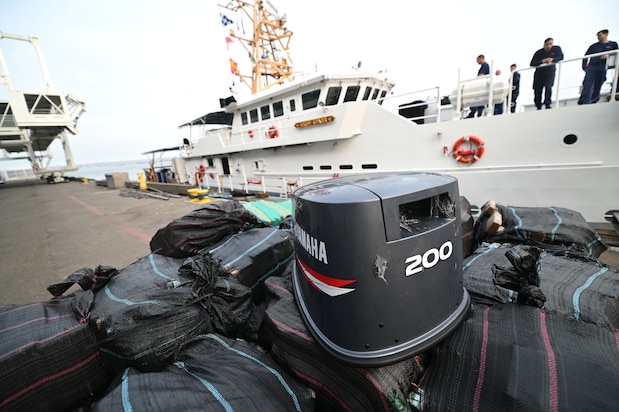 A pile of seized drugs, estimated to be $96 million, is transferred off the Coast Guard Cutter Forest Rednour in San Diego, Sept. 24, 2021.