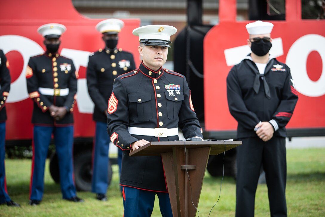 Staff Sgt. Luis Fernandez and HM1 Alexander Collins, coordinators, Toys for Tots, and Capt. Rebecca Sullivan, commanding officer, Salvation Army, gathered aboard Marine Corps Logistics Base Albany to formally kickoff the 74th annual Toys for Tots campaign, Oct. 7. (U.S. Marine Corps photo by Jonathan Wright)