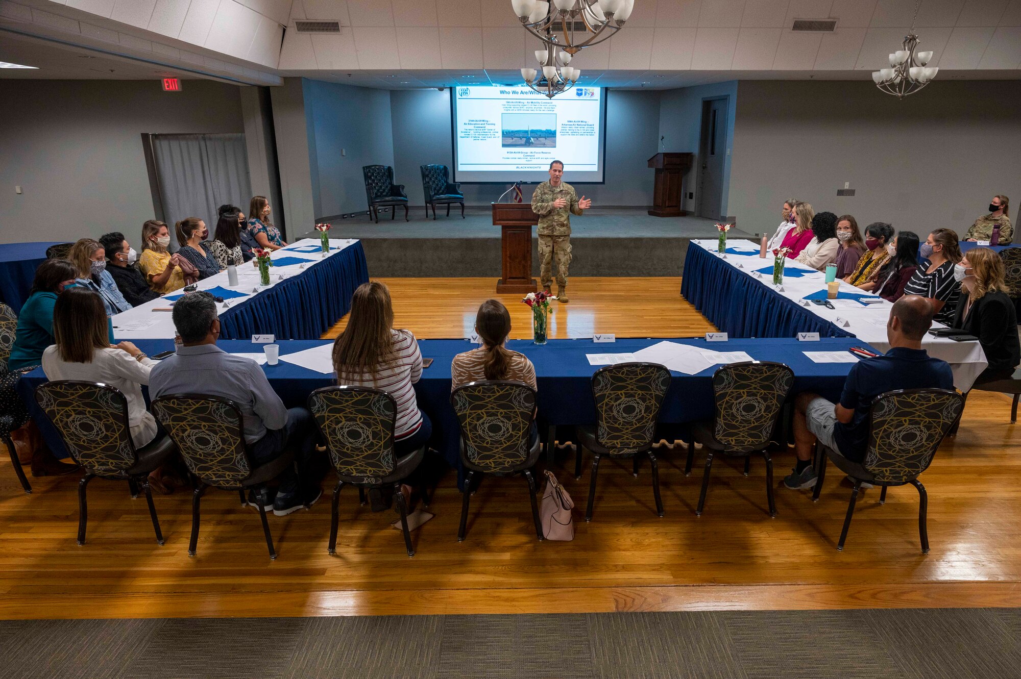 Military spouses receive a briefing during a spouses immersion tour.