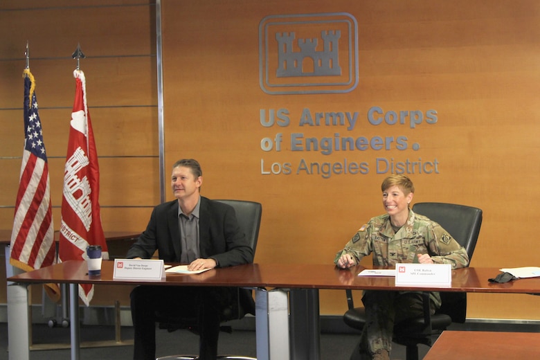 Col. Julie Balten, right, Los Angeles District commander, joins David Van Dorpe, LA District’s deputy district engineer, in leading the district’s virtual town hall and end-of-year celebration Oct. 5, 2021, from the district’s headquarters building.