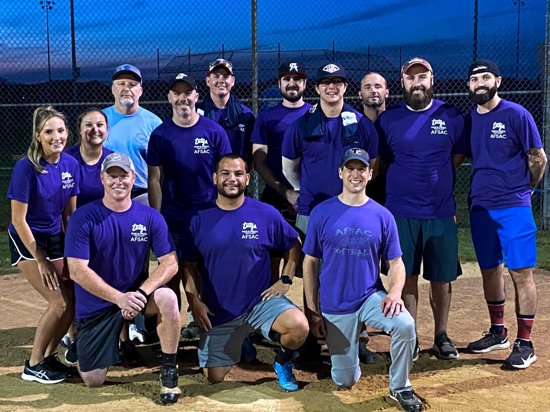 AFSAC-D takes a team photo after its 22-17 win over the AFLCMC Sierra Deltas