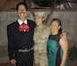 Army Reserve Spc. Luz Hernandez, who is currently deployed to Camp Buehring, Kuwait, with the South El Monte, California, based 155th Combat Sustainment Support Battalion, shares a moment with her parents, Angel Hernandez Mendoza and Maria Guadalupe Lopez- Hernandez. Hernandez said she draws strength from her parents’ legacy. “I am sure there are Mexican heroes, but for me, it was just hearing my dad's and my mom's stories—how they came from nothing in Mexico.” (Photo courtesy of Spc. Luz Hernandez)