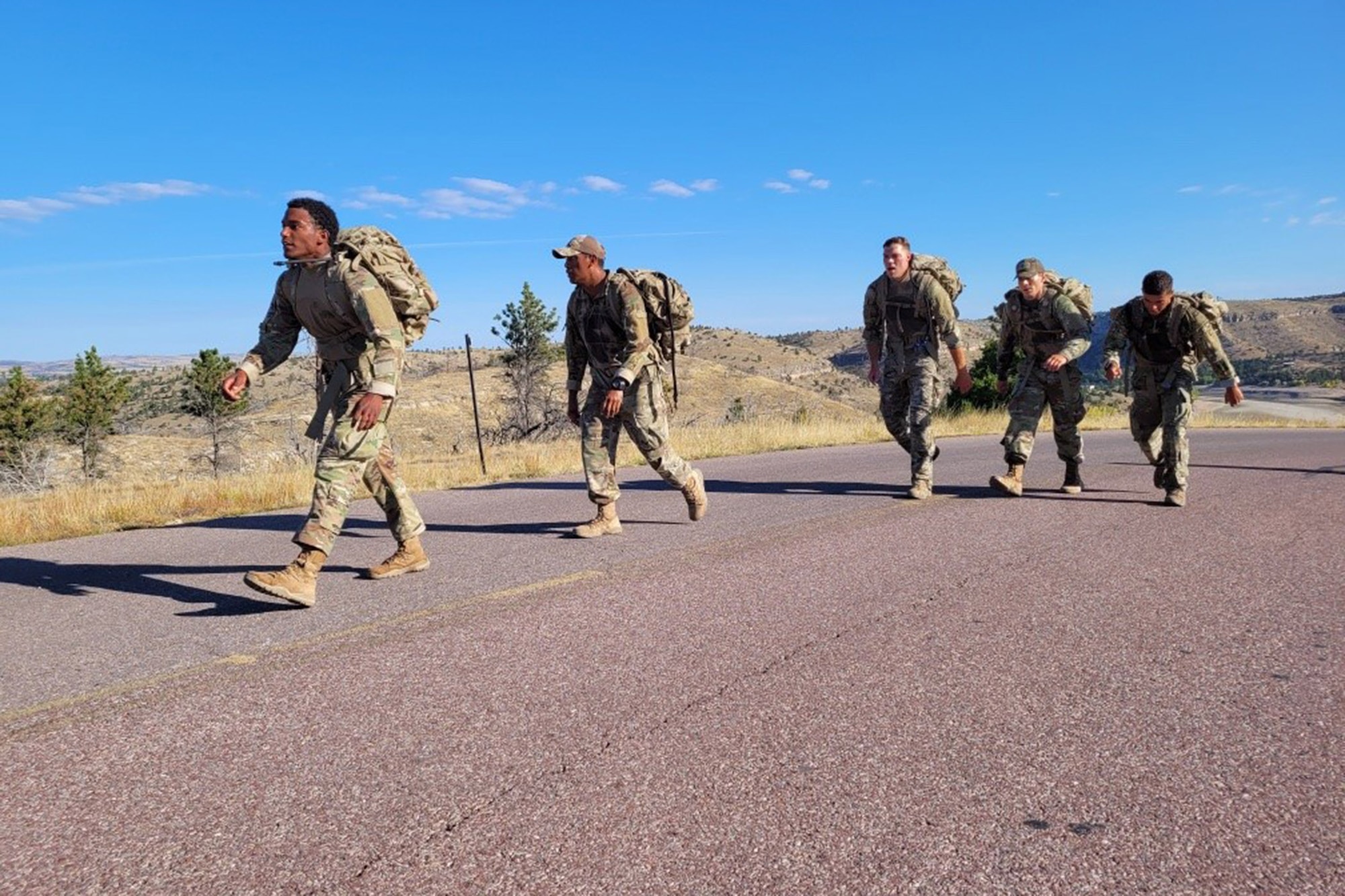 A group of 341st Security Forces Group defenders participate in the warrior ruck event during the 2021 Global Strike Challenge Sept. 24, 2021 at Camp Guernsey, Wyo. The Global Strike Challenge is a biennial competition focusing on defenders, maintainers and operators. (U.S. Air Force courtesy photo)