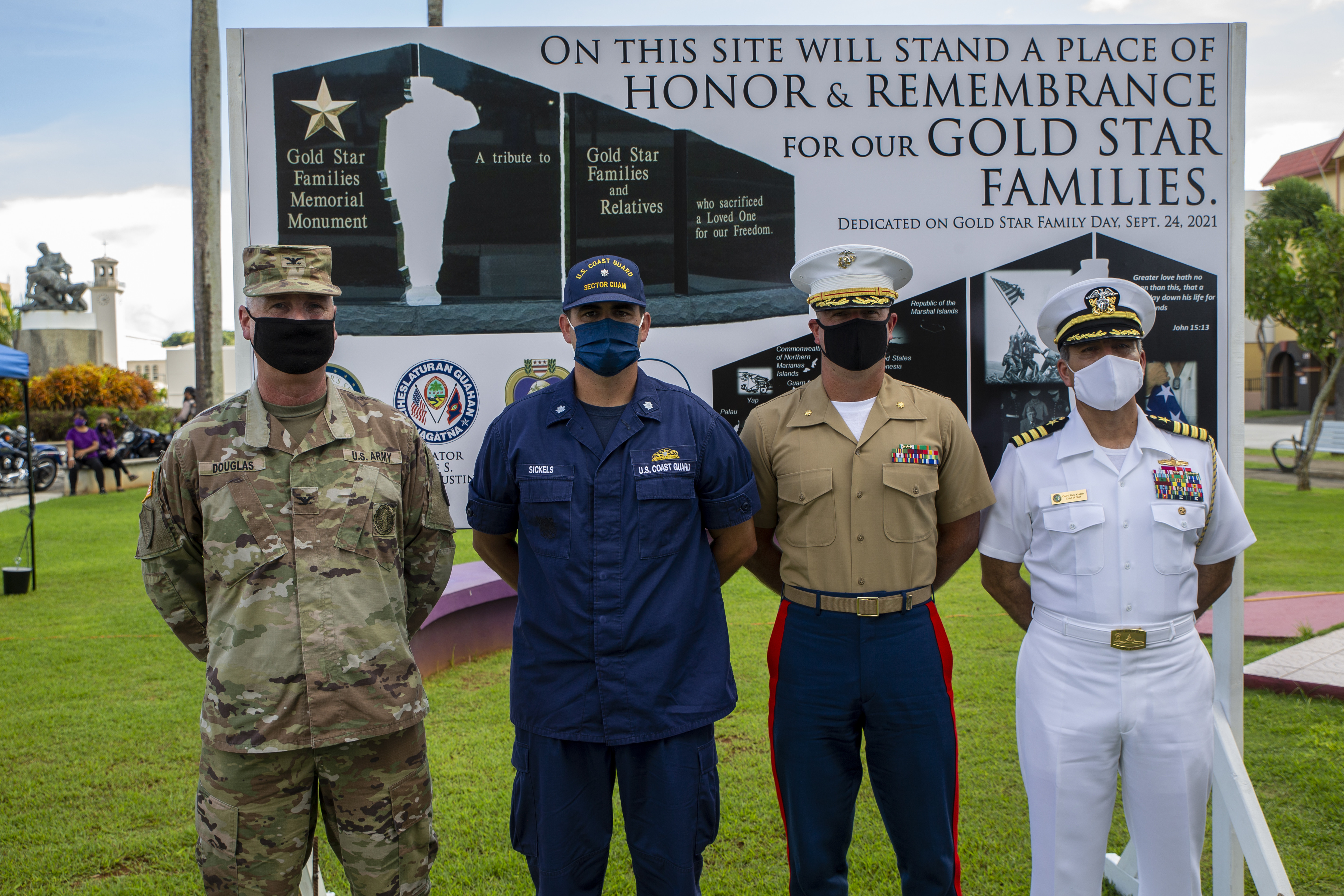 Senior military leaders pose for a photograph during an unveiling ceremony for the Gold Star Families Memorial in Hagåtña, Guam, Sept. 30, 2021.