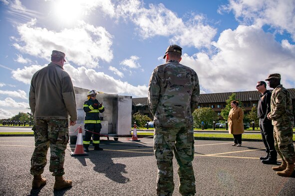 Dave Herman, 423rd Civil Engineer Squadron assistant chief of fire prevention, briefs Airmen and guests from the 501st Combat Support Wing at RAF Alconbury, England, Oct. 4, 2021. The brief was a part of Fire Prevention Week which allowed firefighters from the 423rd CES to educate Airmen and family members from the 501st Combat Support Wing on proper fire safety habits. (U.S. Air Force photo by Senior Airman Eugene Oliver)