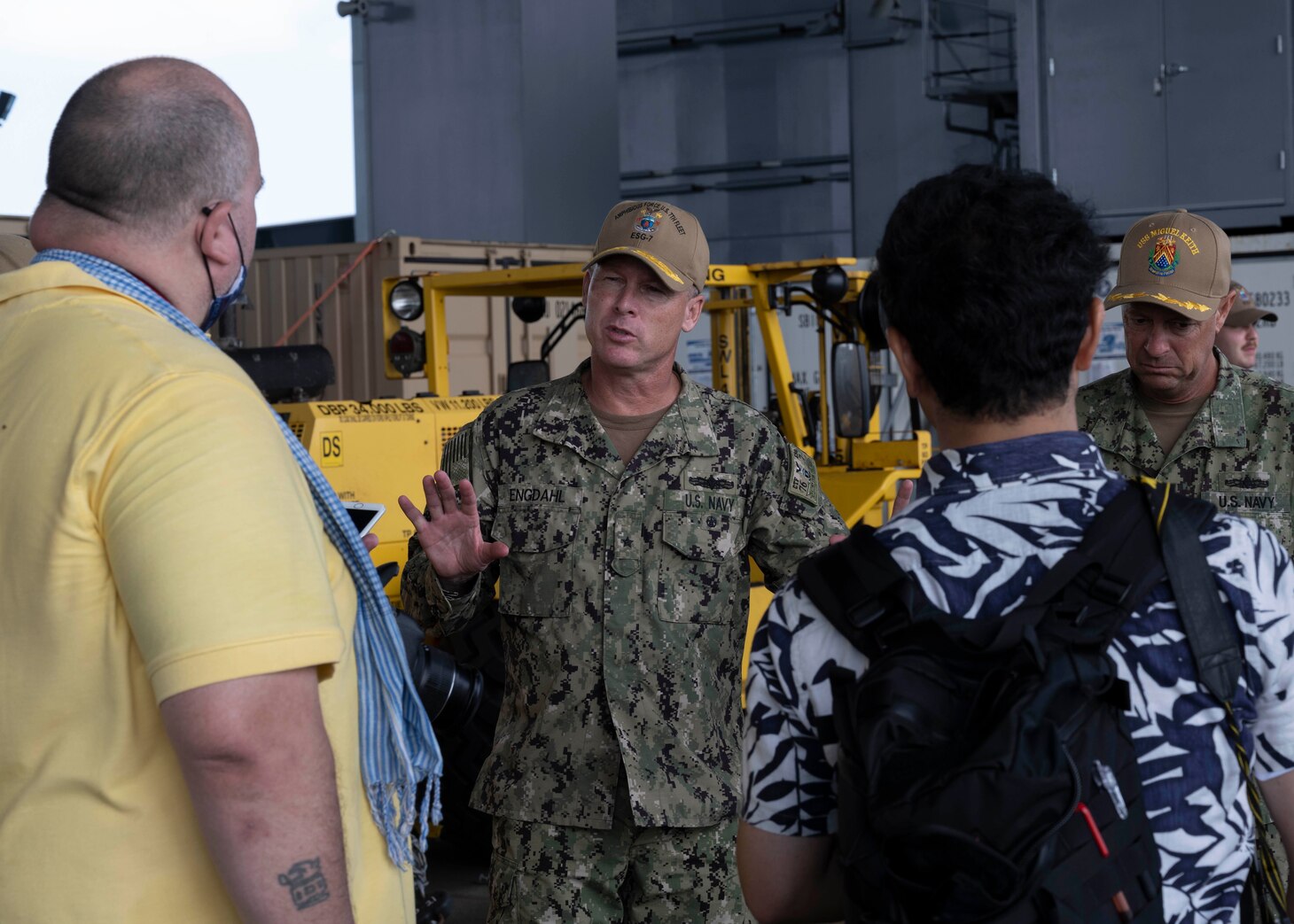 WHITE BEACH, Japan (Oct. 6, 2021) Rear Adm. Chris Engdahl, commander, Expeditionary Strike Group 7, speaks with local media aboard Lewis B. Puller-class expeditionary staging base USS Miguel Keith (ESB 5) to local media  Oct. 6, 2021. Miguel Keith, assigned to Amphibious Squadron Eleven, is operating in the U.S. 7th Fleet area of responsibility to enhance interoperability with allies and partners and serve as a ready response force to defend peace and stability in the Indo-Pacific region. (U.S. Navy photo by Mass Communication Specialist 2nd Class Jessica Ann Hattell)