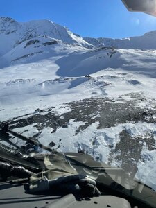 An Alaska Army National Guard UH-60L Black Hawk helicopter crew with the 1st Battalion, 207th Aviation Regiment, rescued three hunters after an avalanche injured two of them at a glacier near Hunter Creek Airstrip Oct. 6, 2021.