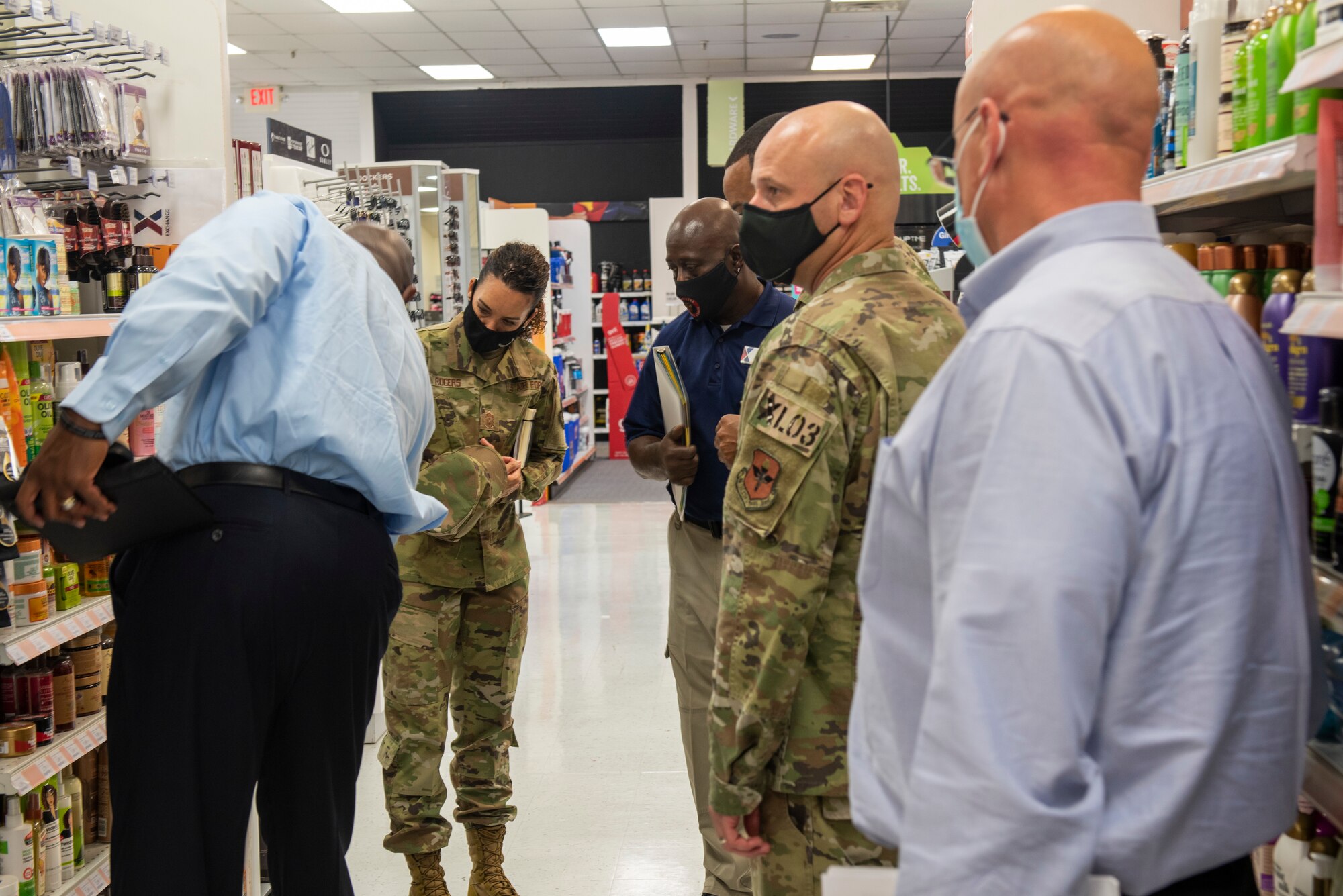 Chief Master Sgt. Kristina L. Rogers 19th Air Force command chief and representatives of the Army & Air Force Exchange Service, tour the base shoppete and discuss what can be improved on Oct. 5, 2021, Laughlin Air Force Base, Texas. The Army & Air Force Exchange Service is the retailer on U.S. Army and Air Force installations worldwide. (U.S. Air Force photo by Senior Airman David Phaff)
