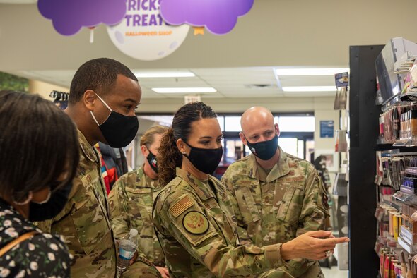 Chief Master Sgt. Kristina L. Rogers 19th Air Force command chief and representatives of the Army & Air Force Exchange Service, tour the base shoppete and discuss what can be improved on Oct. 5, 2021, Laughlin Air Force Base, Texas. The Army & Air Force Exchange Service is the retailer on U.S. Army and Air Force installations worldwide. (U.S. Air Force photo by Senior Airman David Phaff)
