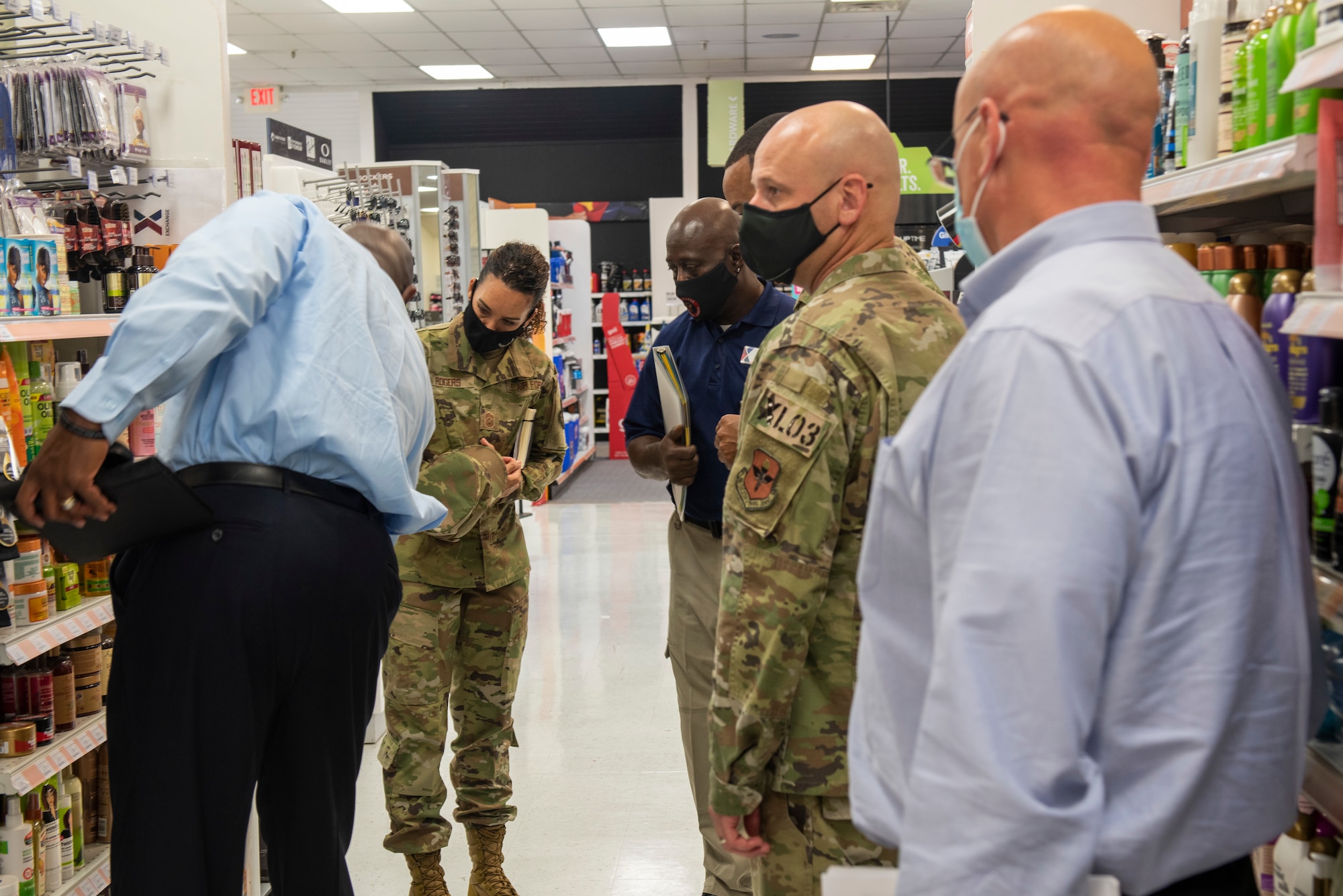 Chief Master Sgt. Kristina L. Rogers 19th Air Force command chief and representatives of the Army & Air Force Exchange Service, tour the base shoppete and discuss what can be improved on Oct. 5, 2021, Laughlin Air Force Base, Texas. The Army & Air Force Exchange Service is the retailer on U.S. Army and Air Force installations worldwide. (U.S. Air Force photo by Senior Airman David Phaff)