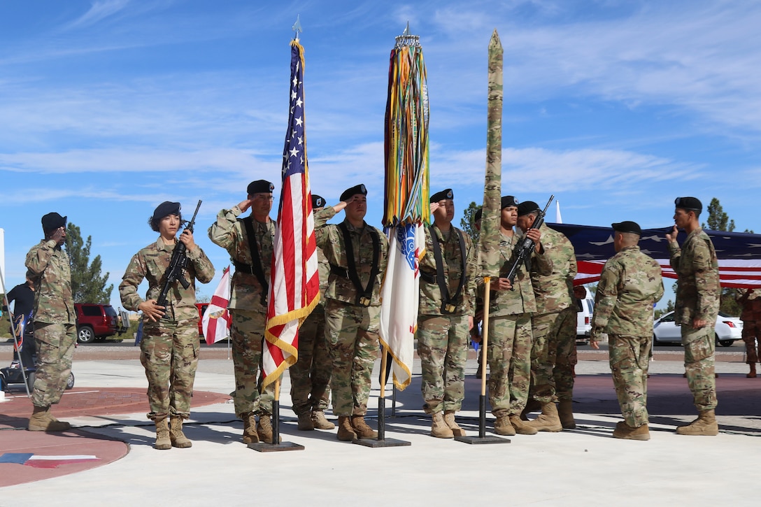 A color guard performs during a parade.